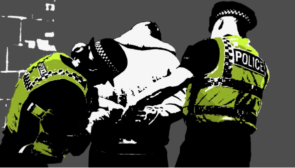 two police officers handcuffing a man, the images are silhouetted